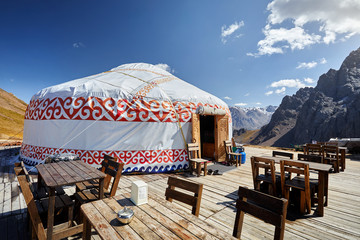 Hospitality and Accessibility - A cozy hotel lobby with elegant decor, welcoming staff, and comfortable seating, symbolizing warm hospitality and ease of access.