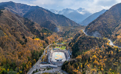 the world’s highest ice rink, nestled in the Zailiyskiy Alatau Mountains surrounding beautiful nature in Almaty.
