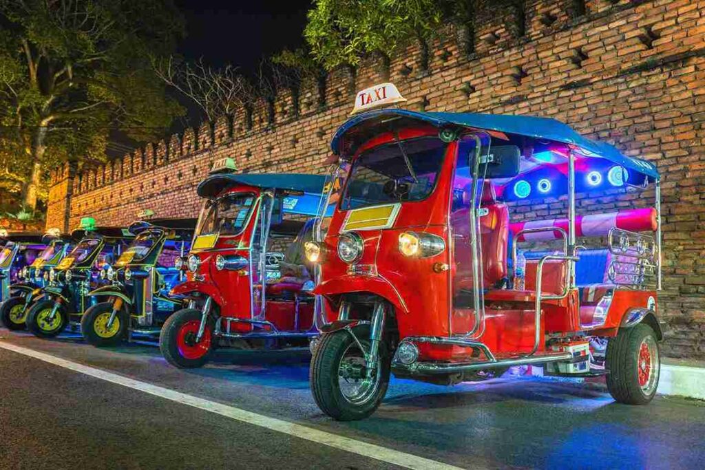 <a href="https://www.freepik.com/free-photo/tuk-tuk-thailand-thai-traditional-taxi-thailand_13180498.htm#fromView=search&page=1&position=0&uuid=258af97b-bf8b-4d7b-b8b8-54a195226a3c">Image by tawatchai07 on Freepik</a>